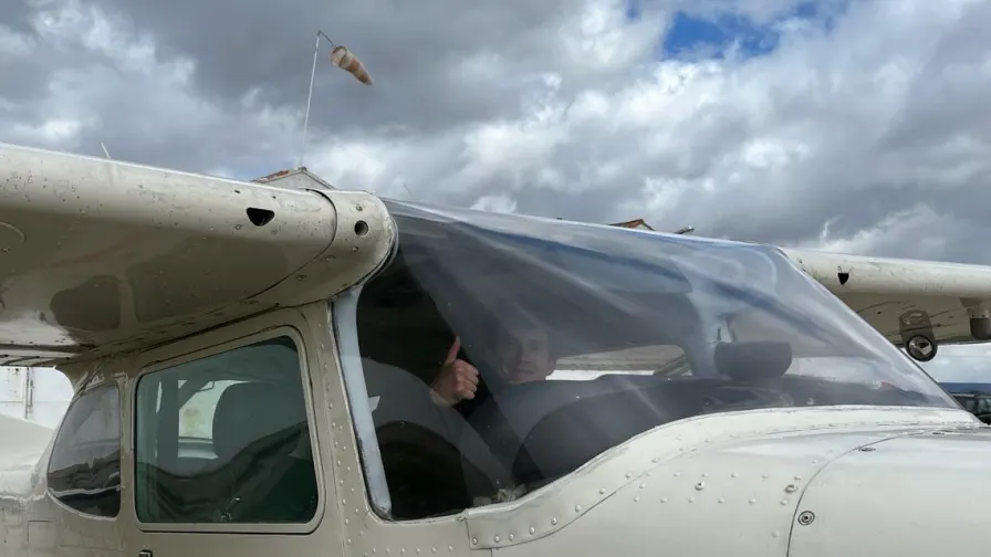 A light aircraft on the apron